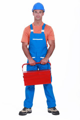 Man holding red tool box