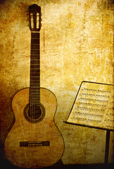 Guitar classic with stand note in grunge background