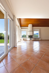 home, arched window, view of room with fireplace