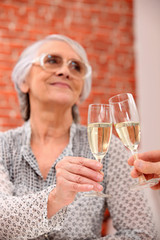 Woman toasting in restaurant