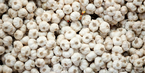 close up of garlic on market stand