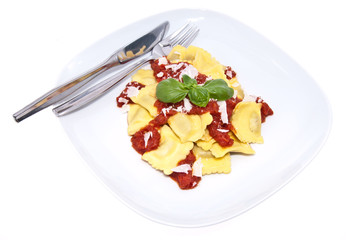 Plate with fresh Raviolis isolated on white