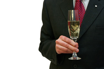 Man in suit holding a glass of champagne