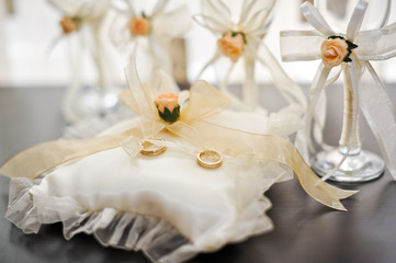 Closeup of golden  wedding rings . DOF focus on diamonds