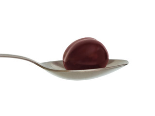 cherry in a spoon