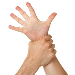 Man holding woman by wrist