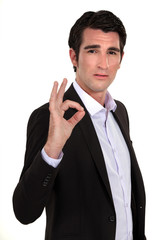Businessman making the OK sign