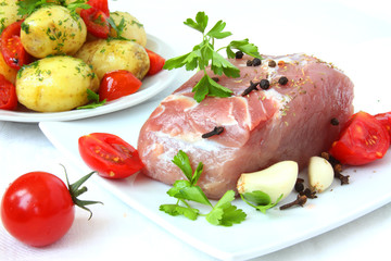 boiled new potatoes and raw meat