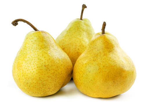 Three  ripe  and juicy pears on a white background