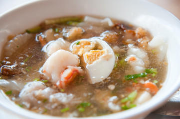 Seafood paste of rice flour (noodle) with egg, shrimp, squid