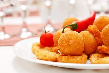 fried onion rings and cheese balls
