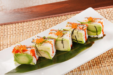 tasty sushi with avocado