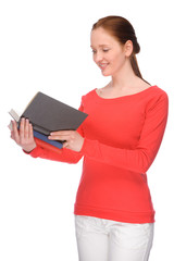 Fototapeta premium Young woman with books
