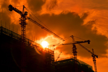 backlight construction site silhouetted at sunset