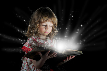 Teen girl reading the Book.