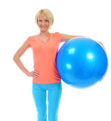Young woman with blue ball