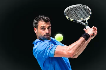 Foto auf Leinwand Tennisspieler bei der Rückhand © herl