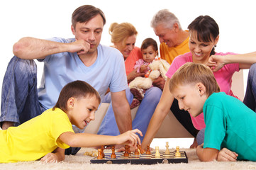 family playing chess