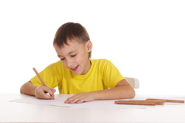 young boy drawing