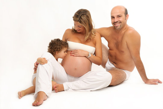 happy family with pregnant woman and a kid