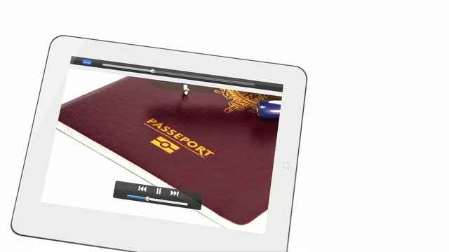 tablette blanche avion et passeport