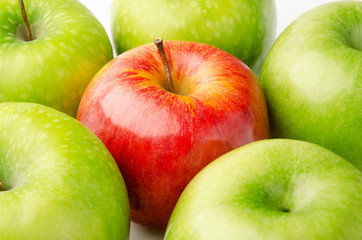 Red Apple Between Green Apples