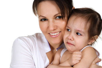 Beautiful nice nurse holding a baby girl