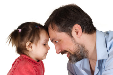 Beautiful Caucasian caring pope holding his daughter in his arms