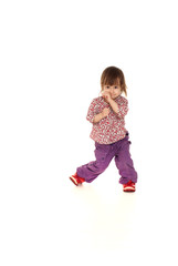 Beautiful little Caucasian girl posing