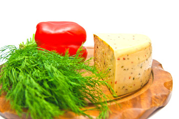 cheese with paprika and herbs on white