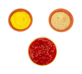 Condiments in small dishes