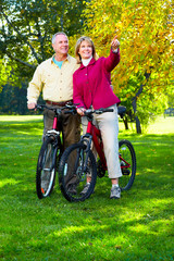 Senior couple cycling