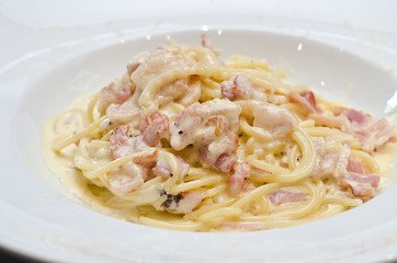 Spaghetti alla Carbonara made with bacon, eggs, cheese and black