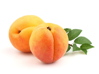 Fototapeta na wymiar Ripe apricots with leaves