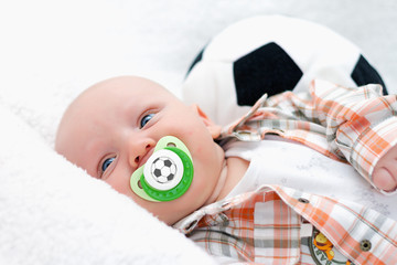 little chap with a pacifier