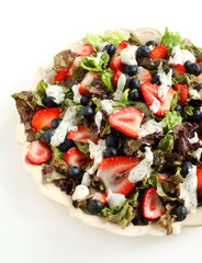 Green salad with strawberry and blueberry