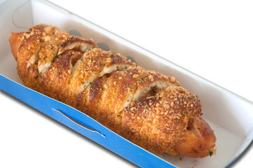 Hot dogs wrapped in crescent rolls with cheese in product