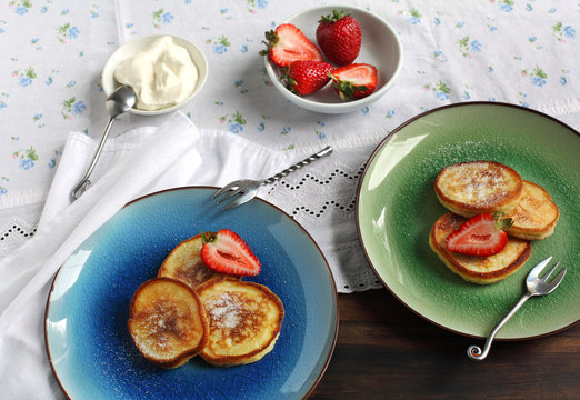 Pancakes with strawberry and cream