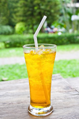 iced chrysanthemum tea (flower tea) on wooden table