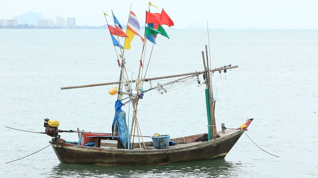 Fishing boat floating on the sea