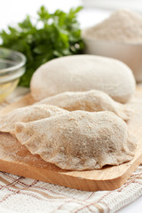 Uncooked dumplings made ​​of flour, meal