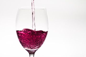 Glass of wine being filled