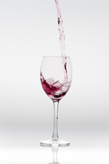 Pink wine poured into a wineglass