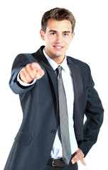 Portrait of business man pointing at you