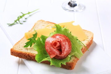 Bread with Swiss cheese and salami