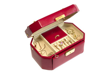 Leather box with gold jewelry on white