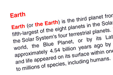 Obraz premium Earth text highlighted in red
