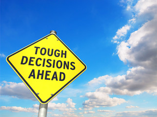 Road Sign TOUGH DECISIONS AHEAD