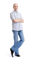 Fototapeta premium Full length portrait of a stylish young man standing