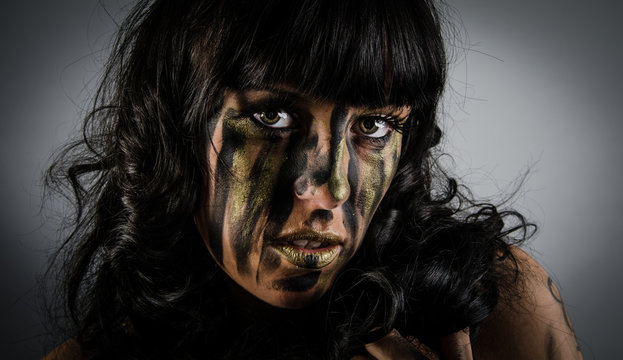 Dark And Mysterious With Camoflauge Paint On Face